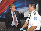 Administrator Kip Hawley talks to a Transportation Security Officer