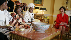 Laura Bush meets with South African women from the Mothers to Mothers-To-Be project at the White House.