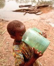 A Mauritanian child enjoying a drink of clean water.