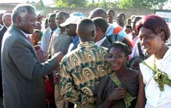 Photo of: Speaker of the National Assembly Amusaa Mwanamwambwa meets the people of Kanyama at the town's new pilot office.