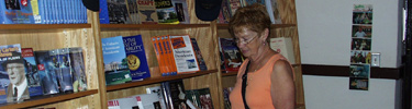 Johna Hershelman browses books at the Bookstore