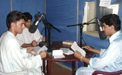 Peace Message Radio hosts read letters written by listeners that are filled with jokes, folk stories, and poems at their studio in the city of Khost, Afghanistan.