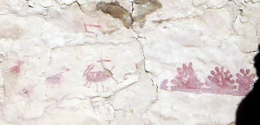 Painted figures on wall at Fire Temple on Chapin Mesa