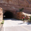 Cyclist entering tunnel on Rim Rock Drive
