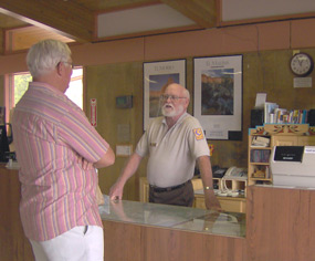 Image of volunteer at front desk