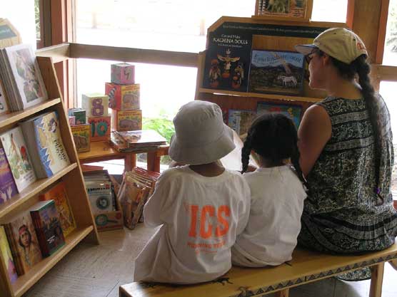 Image of kids and Mom at the kid's corner