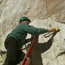Image of National Park Service Volunteer monitoring the large crack in the rock
