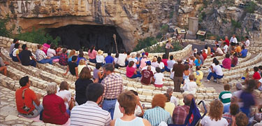 Visitors await the summer's nightly outflight of nearly 400,000 Brazilian (Mexican) free-tail bats out of Carlsbad Cavern.