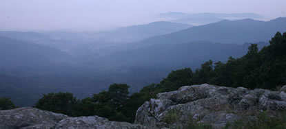 Misty fog and soft morning light create the color which gave the Blue Ridge Mountains their name.