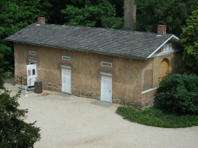 The Arlington House bookstore is in the west end of the north slave quarters behind the house.