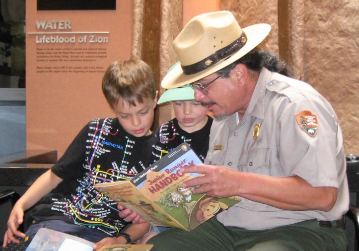 Rangers will review activity booklets with the kids.