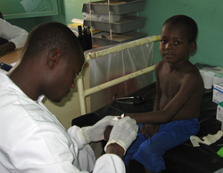 A boy receives the MVDB malaria vaccine candidate at a clinical site in Mali, Africa