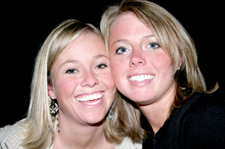 Two young women smiling