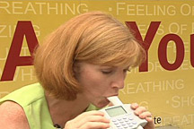 Photo of a woman doing spirometry test