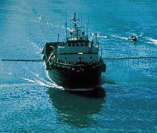 Dispersant application from a ship