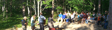 Visitors enjoy the Song of Lakes program at Twelvemile Beach Campground in Pictured Rocks National Lakeshore.