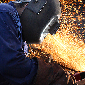 Person using an arc welder