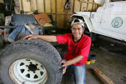 Image of a young man working as a mechanic. USAID Philippines