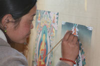 Thanka painter working on a traditional style of Buddhist painting (Photo: The Bridge Fund)