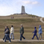 School group climbing the hill