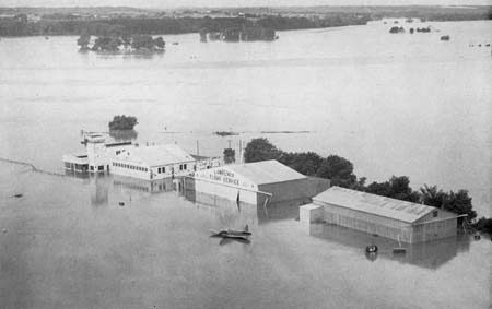 Lawrence Municipal Airport was in 
       the center of a vast boiling sea (photo courtesy of Lawrence Journal World).