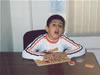 Boyukagha learns through puzzles at a personalized session aimed to improve his cognitive development