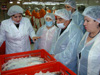 Participants in the USAID-sponsored 'Regulatory Food Inspections to Ensure Safe Food' training observed seafood processing procedures at the Caspian Fish Company in Baku, Azerbaijan.