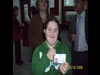 Arjeta, member of an advocacy group for people with development disabilities, shows off her Identity Card.