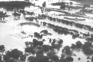 Aerial view of floodwaters 
    in North Topeka, July 13, 1951 (Kansas State Historical Society copy and reuse 
    restrictions apply).