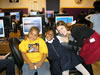 USRVI volunteer and children at a Cleveland, Ohio internet resource center