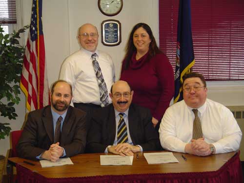 (L to R - Sitting) Christopher R. Adams, Area Director, Region II, Syracuse, New York Area Office, USDOL-OSHA; Dr. Joseph Marinelli, District Superintendent, Wayne Finger Lakes Board of Cooperative Educational Services (WFLBOCES); Dr. John Boronkay, Director, Career and Technical Education, WFLBOCES; (L to R, Standing) Craig Logan, Principal, Wayne Technical and Career Center; and Dawn Larson, Principal, Finger Lakes Technical and Career Center. 