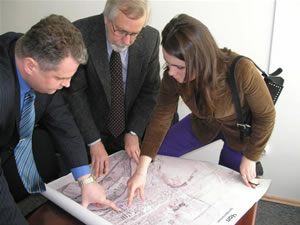 Chop's Mayor Volodymyr Gorynetsky demonstrates strategic map of the city to MBR specialists