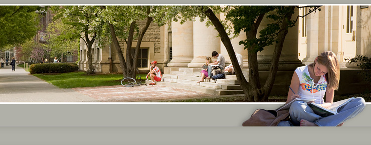 Students study on the steps of Goldwin Smith Hall