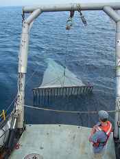 Beam trawl used to capture young-of-year lake trout at East Reef, Lake Michigan.  Trawl is being deployed off the University of Wisconsin research vessel 