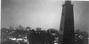 Dimmed and camoflagued Sandy Hook lighthouse at night in World War II.