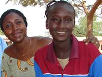 The Ambassadors Girls Scholarship Program (AGSP) puts a smile on Rachida Moussa, right, and her mentor, Madame Bernadette Ouinin Mora 