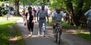People walking and biking along the Schuylkill River Trail.