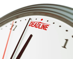 A clock with the word deadline