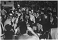 H0060-1. Naval Officers take a break at an officer's club on a Pacific Island. 1943.