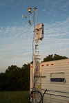 The tower on the back of the USGS Mobile Atmospheric Mercury Laboratory on-site at Mt. Horeb, WI. The laboratory is designed to pump in air for analysis of mercury species (elemental mercury (Hg0), gaseous ionic mercury (Hg+2,+1), and particulate mercury)
