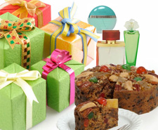 image of christmas gifts, perfume, and fruit cake