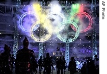 The Olympic rings are lit during the opening ceremony for the 2006 Winter Olympics in Turin