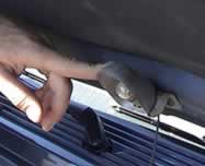Photo of a small light under the hood of a car. It is turned on by a mercury switch. More info on switch recovery programs://www.epa.gov/mercury/switch.htm