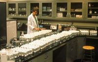 U.S. Environmental Protection Agency scientist constructing soil microcosms for a study of contaminant biodegradation rates at the site (circa 1989)