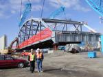 Photo of Federal Highway and ConnDOT engineer with truss in the background