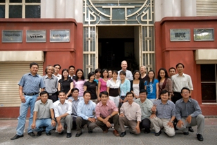 Professor Rusty Todd with the participants of the workshop in front of the Saigon times building