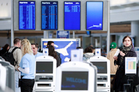 Travellers at John F. Kennedy International Airport,JetBlue terminal 