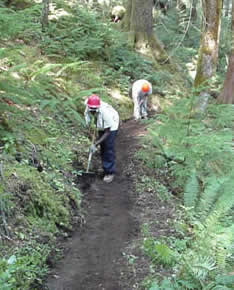 [Photo: Repairing trails in Oregon.]