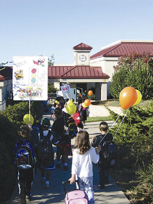 The National Bicycle and Pedestrian Clearinghouse has coordinated, both nationally and internationally, International Walk to School activities such as this one, where children are walking to Auburn Elementary School in California. Photo: International Walk to School.