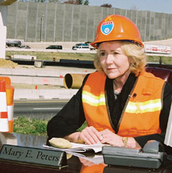 FHWA Administrator Mary E. Peters recently set up an outdoor office in the median of an interchange on I-95 in Springfield, VA, to kick off National Work Zone Safety Awareness Week.